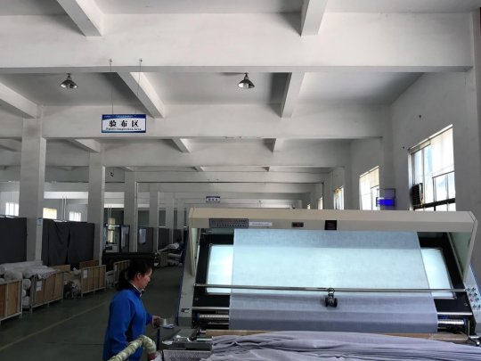 Fabric Inspection Area - Fabric is checked upon receipt from the supplier, any faults are tagged. Fabric is checked again after coating, any faults are tagged again